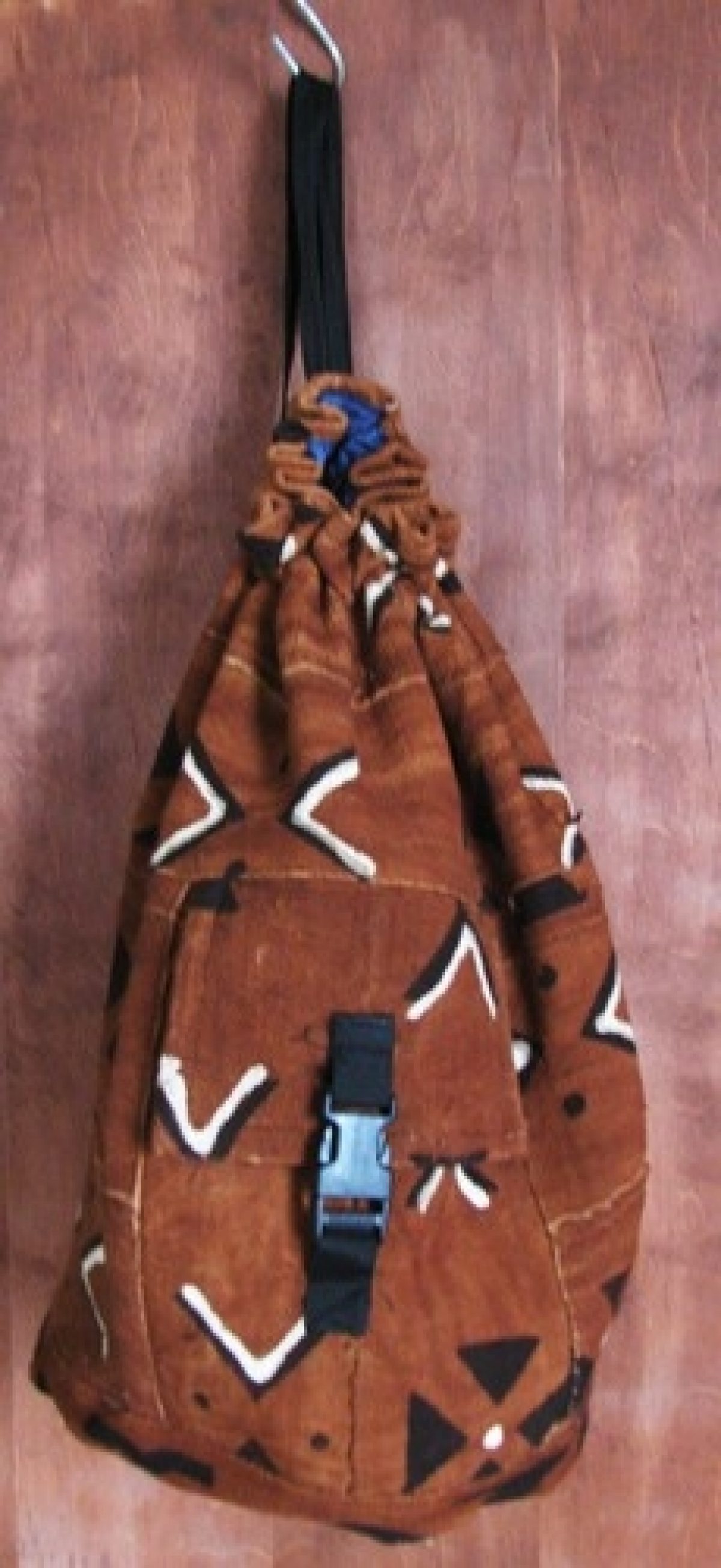 Leather pouch with brown kente